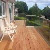 Balcony Garapa deck with Qrail easy glass balustrade and stainless steel handrail