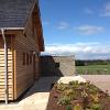 View looking north, Larch cladding and Denfind stone