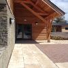 Denfind stone, Douglas Fir frame and Larch cladding at the entrance