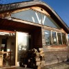 Exterior naturally weathered larch cladding