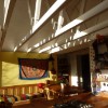 Dining space with trusses controlling direct sunlight
