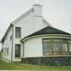 The rounded living room takes advantage of views over the Foyle and beyond